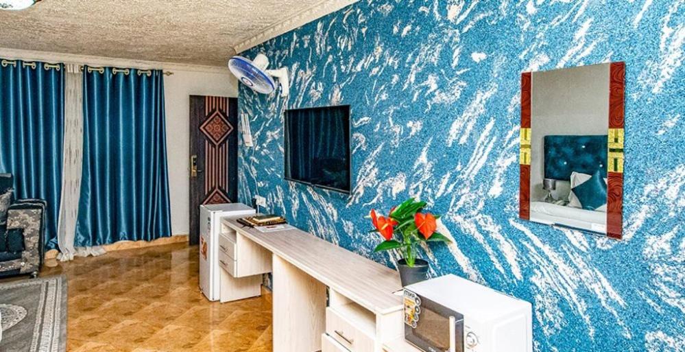 TV a/nebo společenská místnost v ubytování Nur Complex Hotel & Apartment
