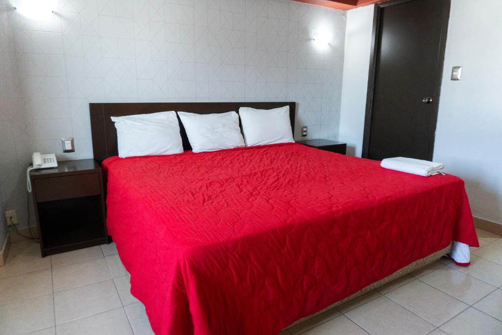 Postel nebo postele na pokoji v ubytování Hotel ROLOVI