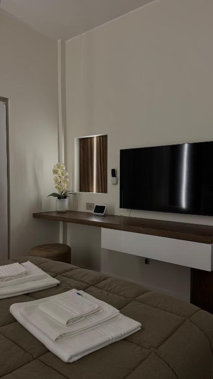 TV a/nebo společenská místnost v ubytování B&B IV Novembre