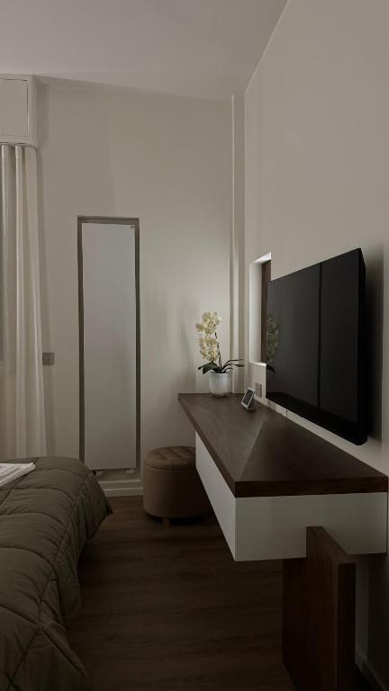 TV a/nebo společenská místnost v ubytování B&B IV Novembre