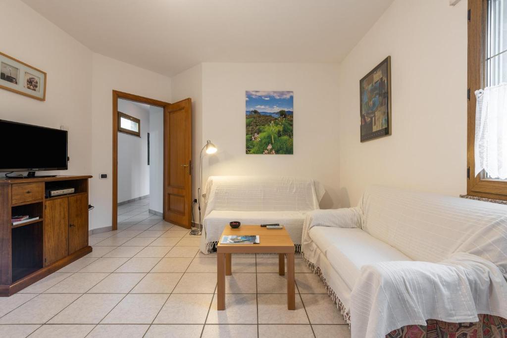 Televízia a/alebo spoločenská miestnosť v ubytovaní Casa Colonia 1