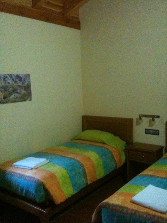 Posteľ alebo postele v izbe v ubytovaní Casa de Montaña Alto Curueño