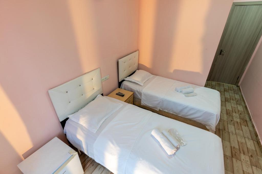 Postel nebo postele na pokoji v ubytování Hotel Ponto Vechio