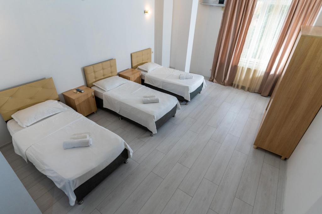Postel nebo postele na pokoji v ubytování Hotel Ponto Vechio