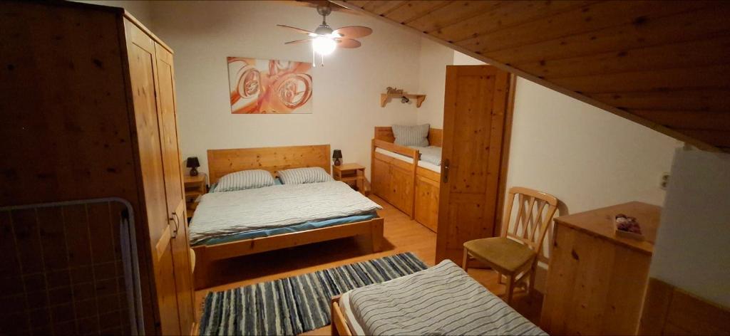 Postel nebo postele na pokoji v ubytování Tatralandia Apartman 323