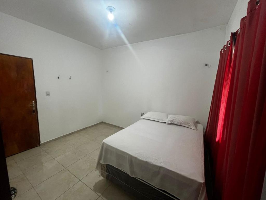 Postel nebo postele na pokoji v ubytování Casa Simões