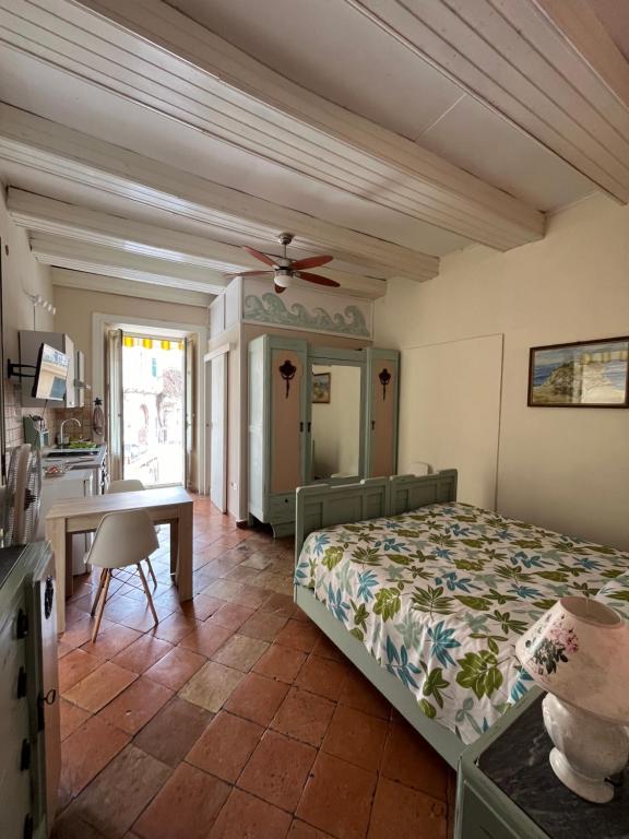 Ένα ή περισσότερα κρεβάτια σε δωμάτιο στο A casa di Nicoletta