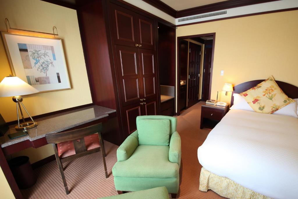 Postel nebo postele na pokoji v ubytování Mito Plaza Hotel