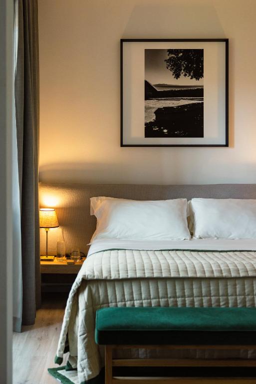 Postel nebo postele na pokoji v ubytování La Serena Hotel FDM