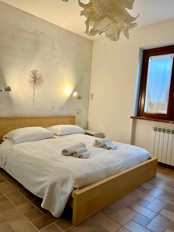 Postel nebo postele na pokoji v ubytování Conero Mare Verde