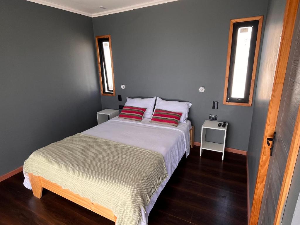 Postel nebo postele na pokoji v ubytování Chagual Los Vilos Lodging