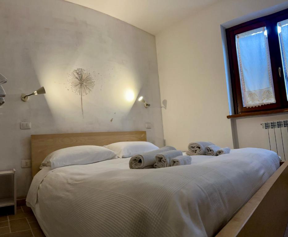 Postel nebo postele na pokoji v ubytování Conero Mare Verde