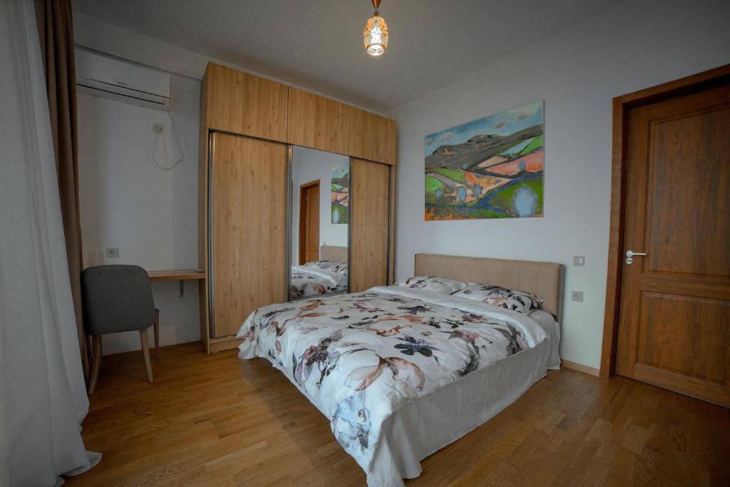 Postel nebo postele na pokoji v ubytování Luxury Villas in Alazani Valley Residence