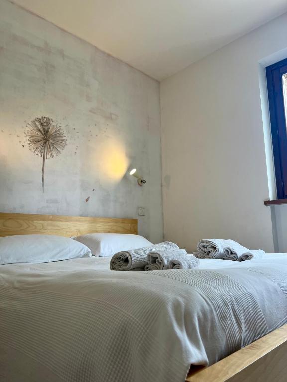 Postel nebo postele na pokoji v ubytování Conero Mare Verde