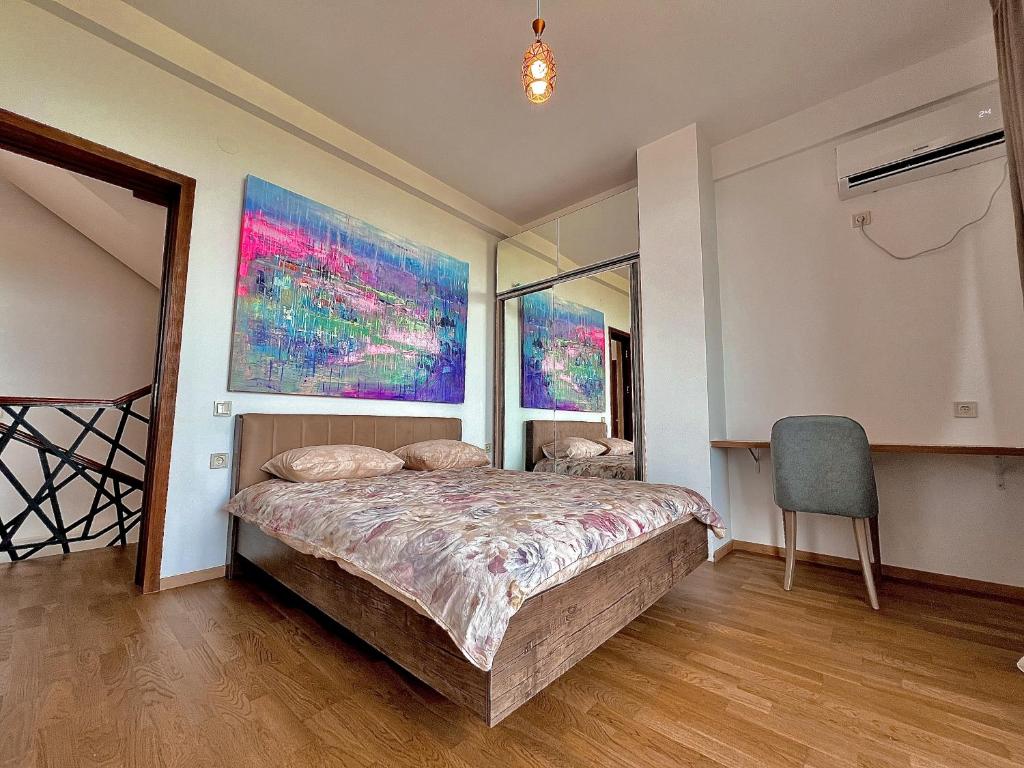 Postel nebo postele na pokoji v ubytování Luxury Villas in Alazani Valley Residence
