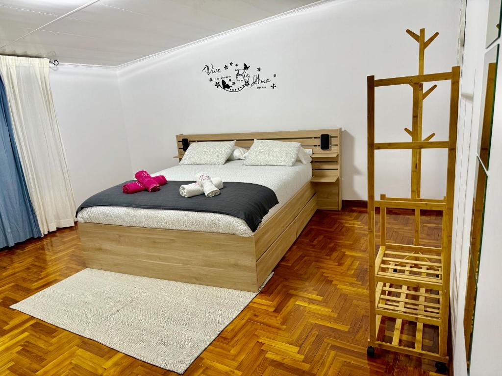 Postel nebo postele na pokoji v ubytování Casa Ribe