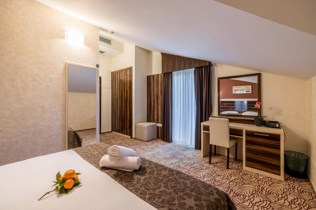 Postel nebo postele na pokoji v ubytování Hotel Terra