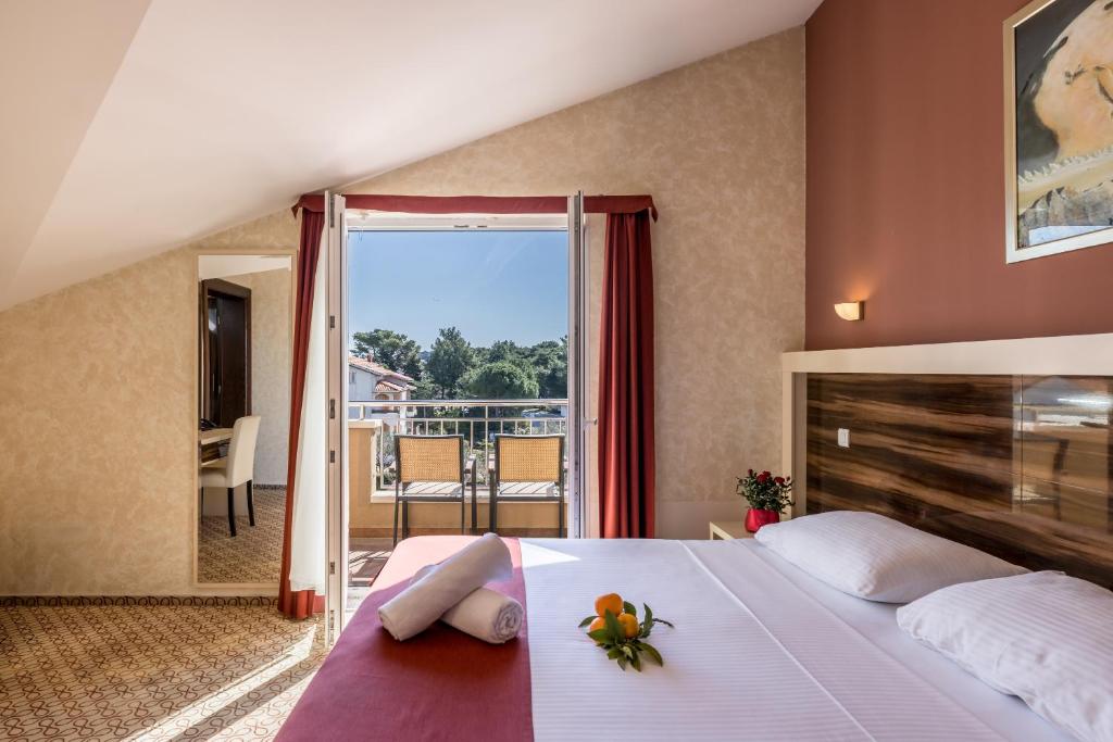 Postel nebo postele na pokoji v ubytování Hotel Terra
