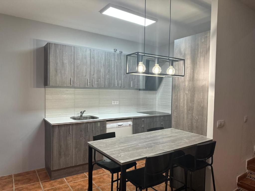 A kitchen or kitchenette at TPA - Les Tres Cales - 1