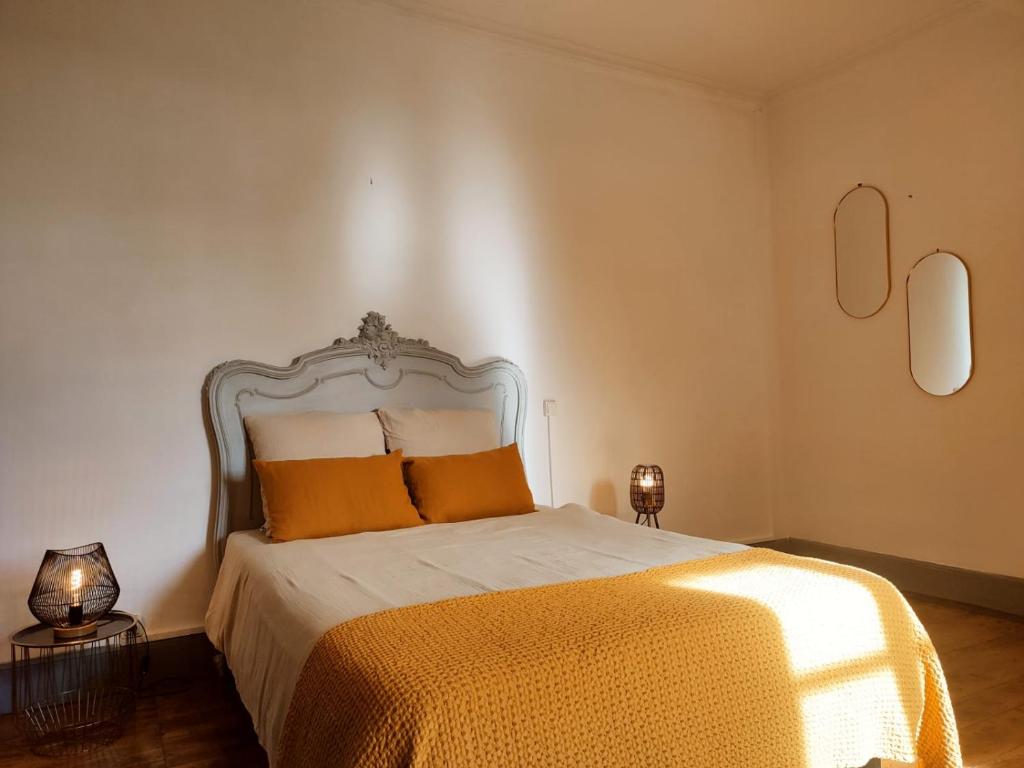 Postel nebo postele na pokoji v ubytování Manoir d Armagnac