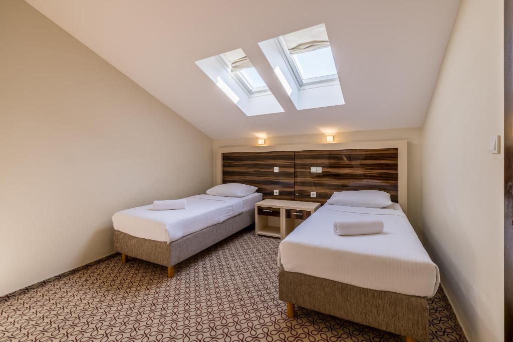 Postel nebo postele na pokoji v ubytování Hotel Terra