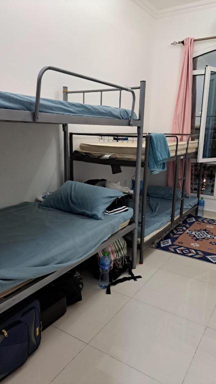 Postelja oz. postelje v sobi nastanitve Mohammad dormitory