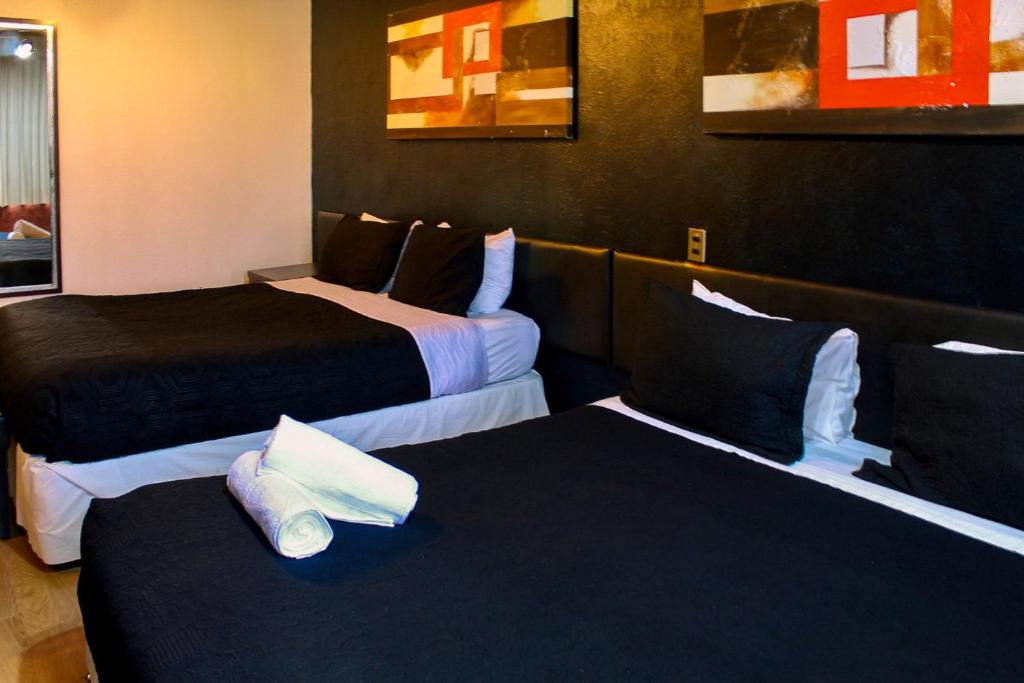 Postel nebo postele na pokoji v ubytování Hotel Sonetto