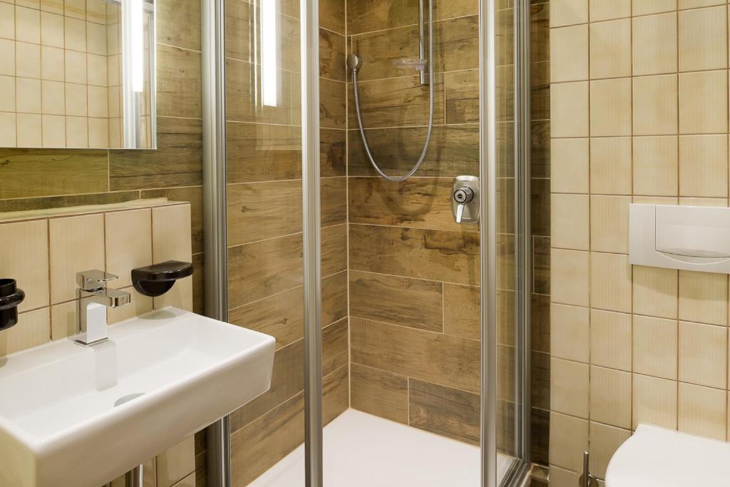 Koupelna v ubytování Hotel am Brenner