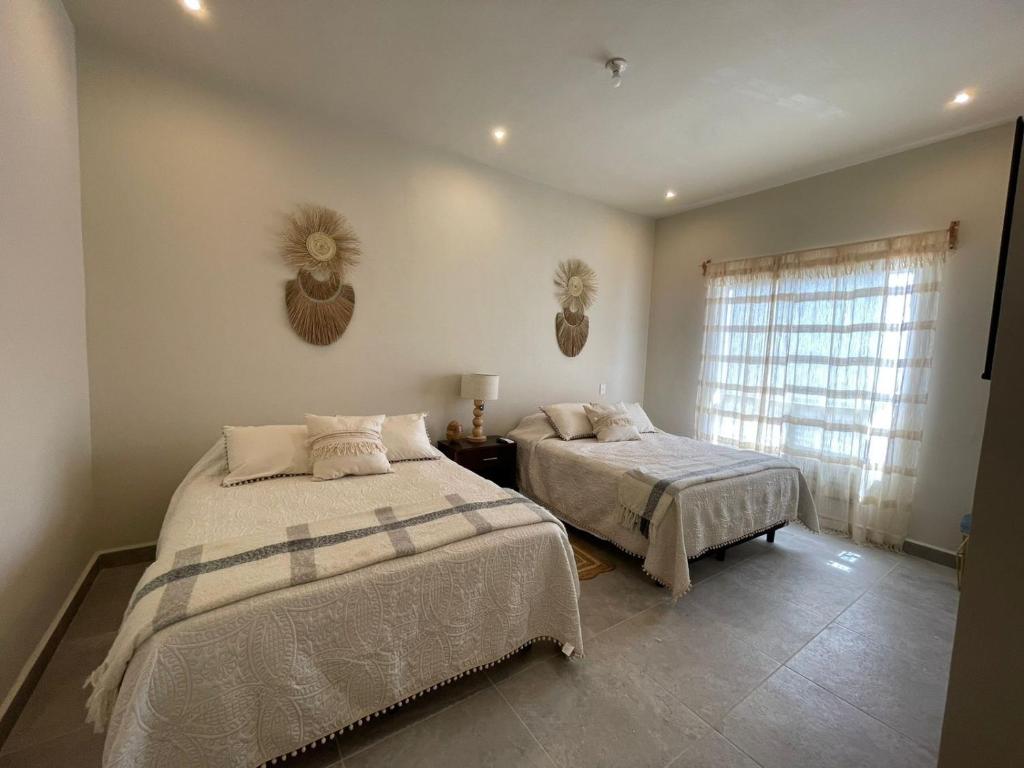 Postel nebo postele na pokoji v ubytování Casa Duna Cuatro Ciénegas