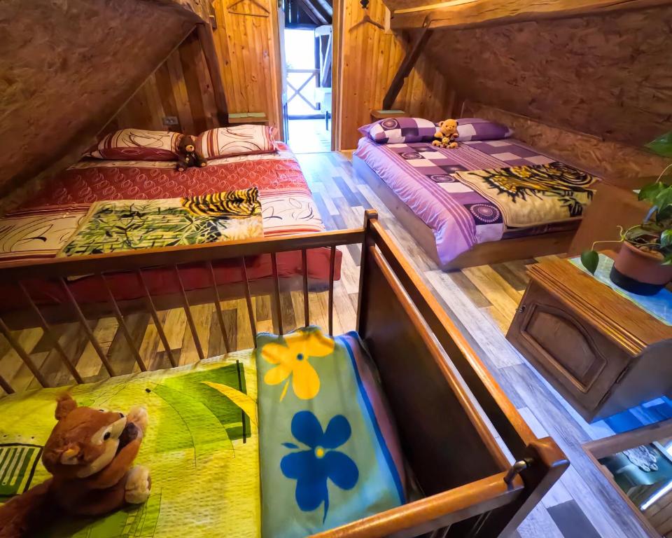Postel nebo postele na pokoji v ubytování Apartment Pajek on the Hayrack