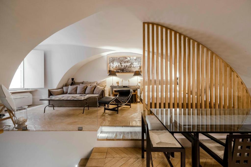 a living room with a couch and a table at Piazza Navona Luxury Loft in Rome