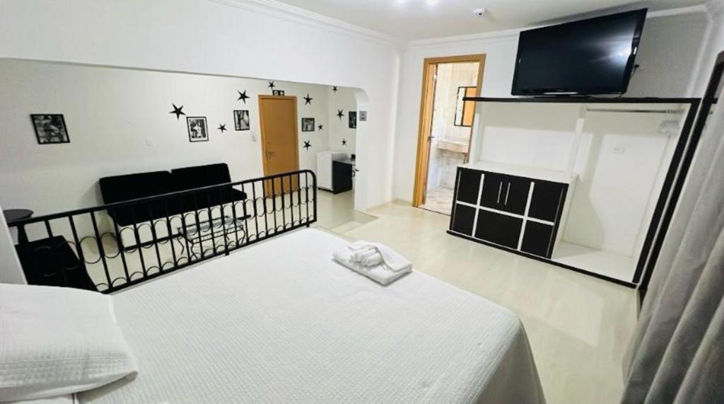 Postel nebo postele na pokoji v ubytování Grande Hotel