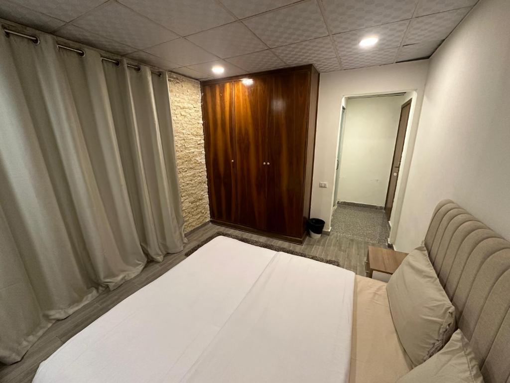Postel nebo postele na pokoji v ubytování Egy Days Hotel