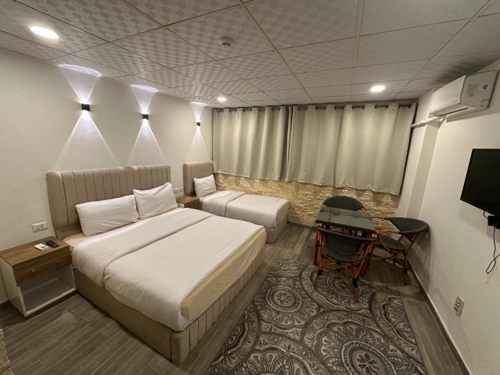 TV a/nebo společenská místnost v ubytování Egy Days Hotel