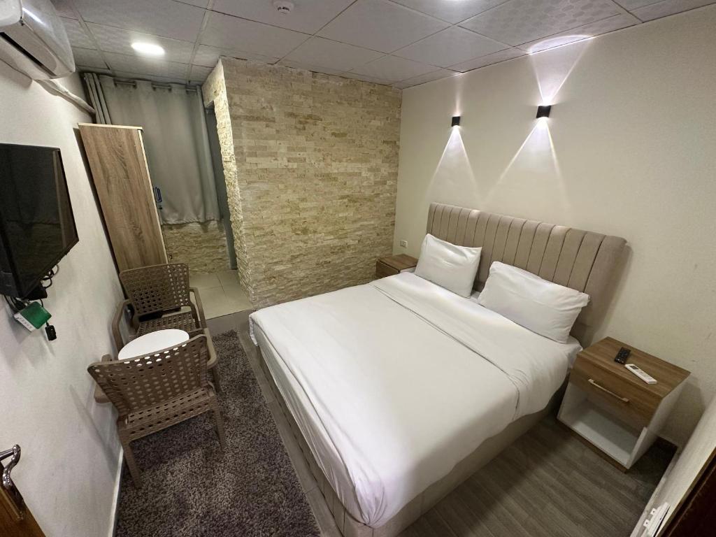Postel nebo postele na pokoji v ubytování Egy Days Hotel