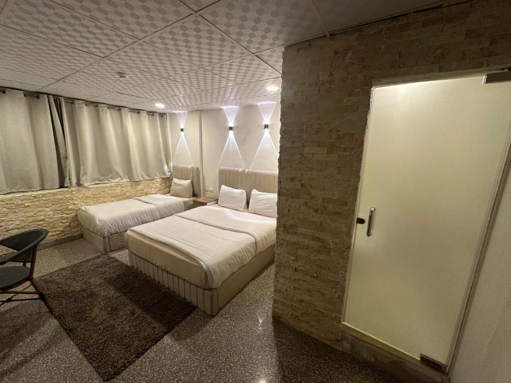 Postel nebo postele na pokoji v ubytování Egy Days Hotel