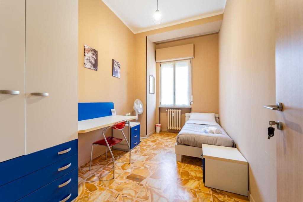 Postel nebo postele na pokoji v ubytování Casa Lungogesso