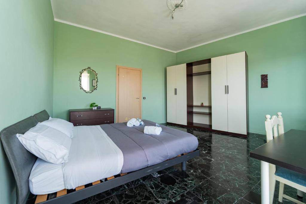 Postel nebo postele na pokoji v ubytování Casa Lungogesso