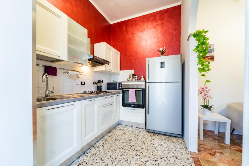 Kuchyň nebo kuchyňský kout v ubytování Casa Lungogesso
