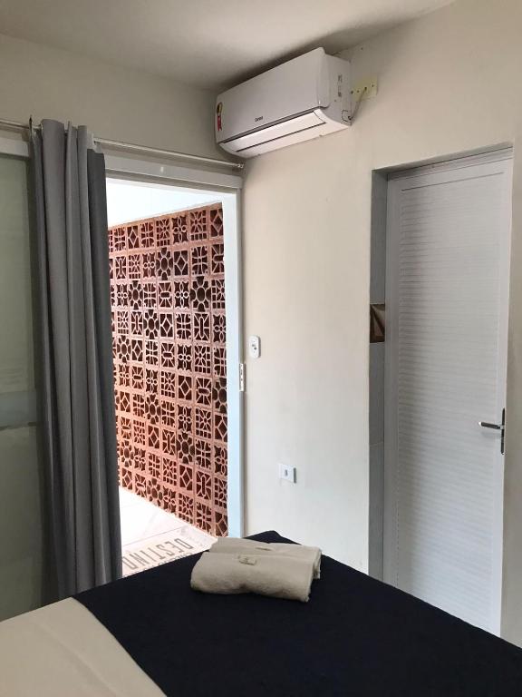 Postel nebo postele na pokoji v ubytování Pousada Caminho de Moises