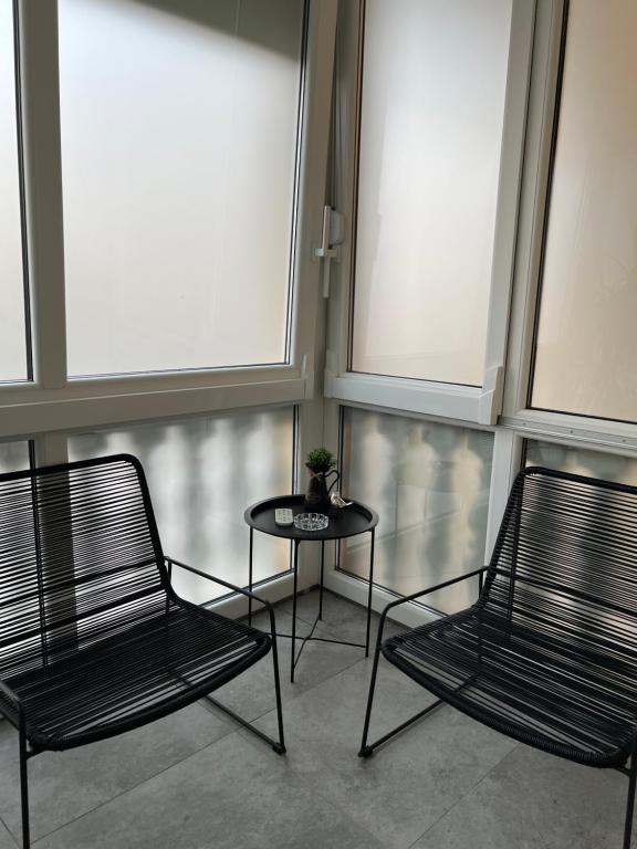 Posezení v ubytování LuxRooms - Hotel type with private jacuzzi
