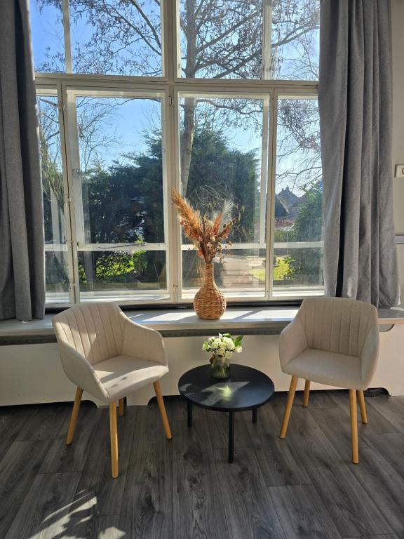 Posezení v ubytování Hart van Warder