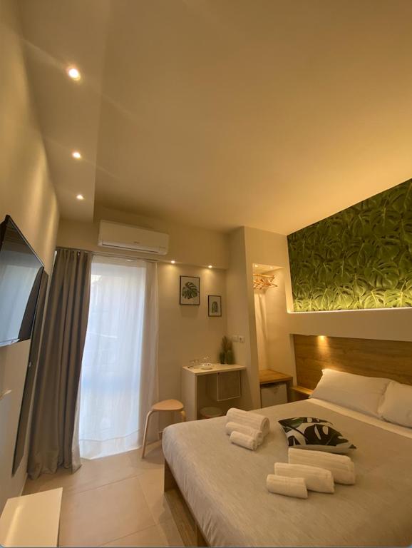 Postel nebo postele na pokoji v ubytování La Volta Rooms Locazione turistica