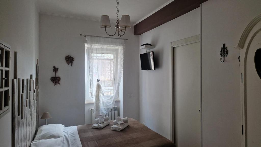 A bed or beds in a room at Il Mare Di Roma