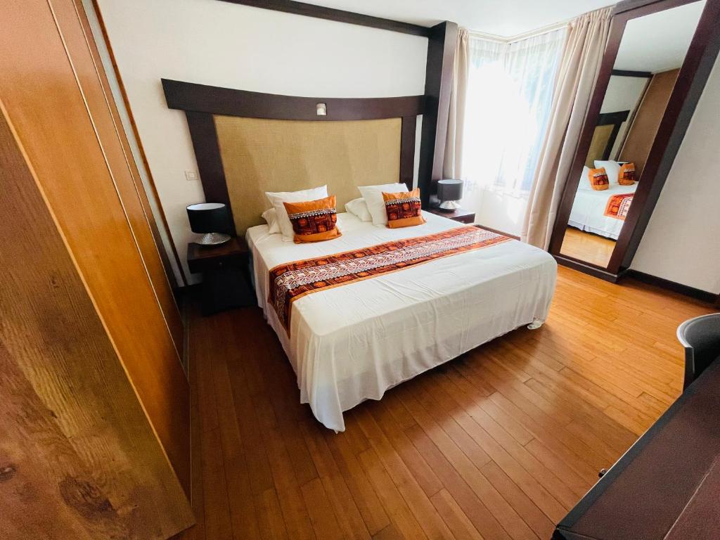 Voodi või voodid majutusasutuse Coral suite vue sur mer toas