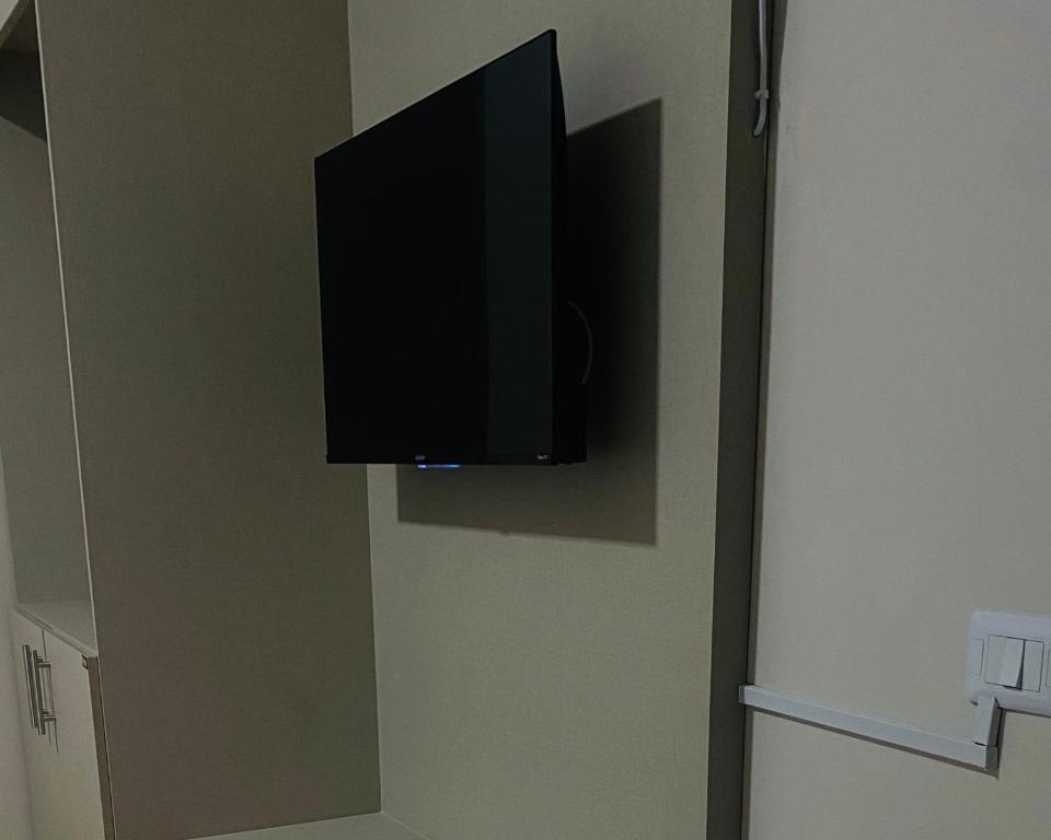 TV a/nebo společenská místnost v ubytování Hotel Marechal Express