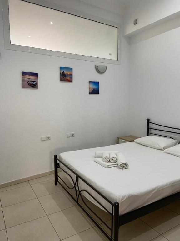 Postel nebo postele na pokoji v ubytování Sisifou Hostel