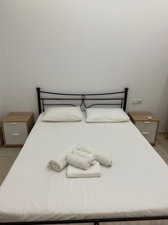 Postel nebo postele na pokoji v ubytování Sisifou Hostel