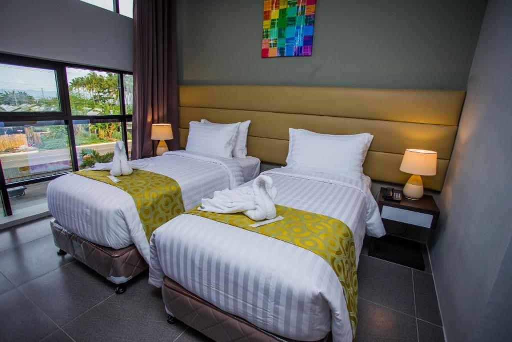Postel nebo postele na pokoji v ubytování Hotel Costa Brava