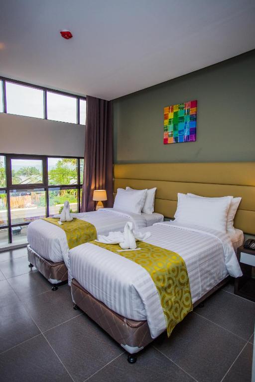 Postel nebo postele na pokoji v ubytování Hotel Costa Brava